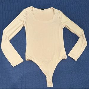 Express pale pink bodysuit body contour snap bottom long sleeve/ Small